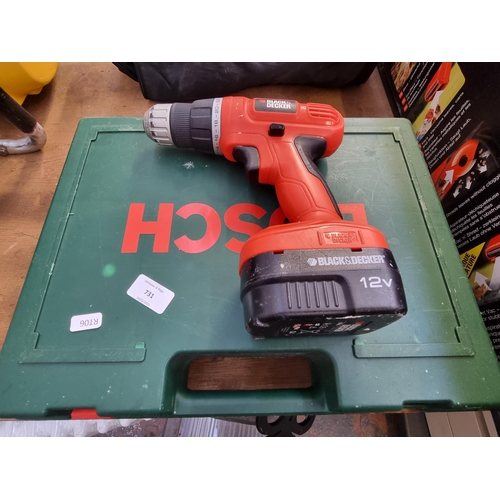 731 - Two items, one cased Bosch cordless 24v hammer drill with two batteries, charger and instruction man... 