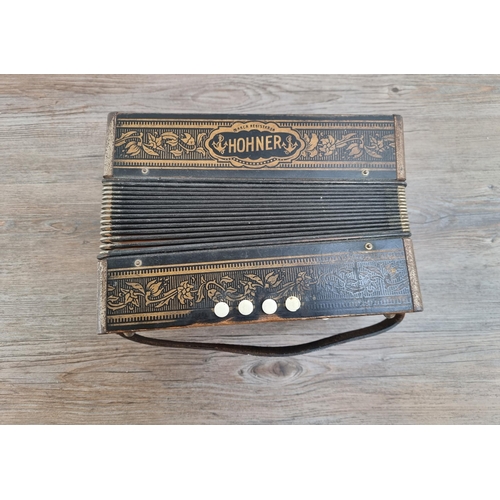 626 - A vintage Hohner Pokerwork Button Melodeon