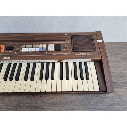 628 - A Casio Casiotone 401 electronic keyboard