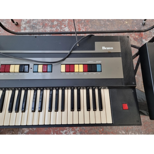 631 - A vintage Farfisa Bravo electronic home keyboard with stand