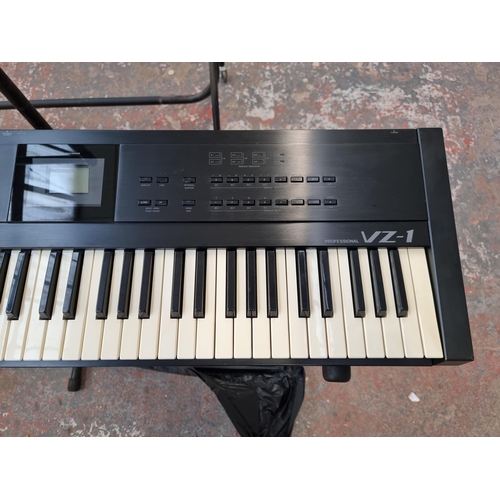 632 - A Casio VZ-1 Professional electronic keyboard with cover and stand