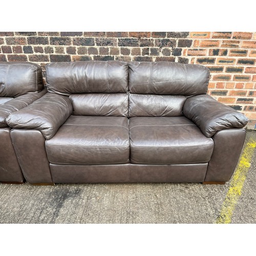 156 - A Violino brown leather three piece lounge suite