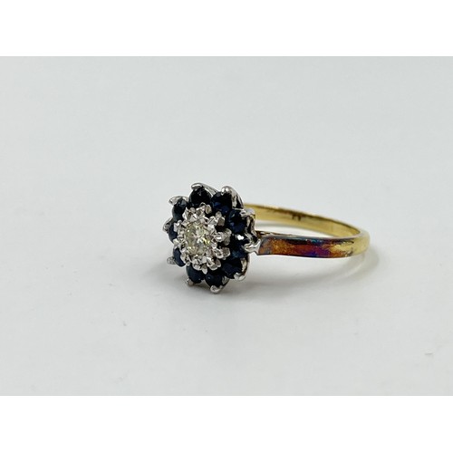 1082 - A hallmarked London 18ct gold sapphire and diamond cluster ring, dated 1967, size P - approx. gross ... 