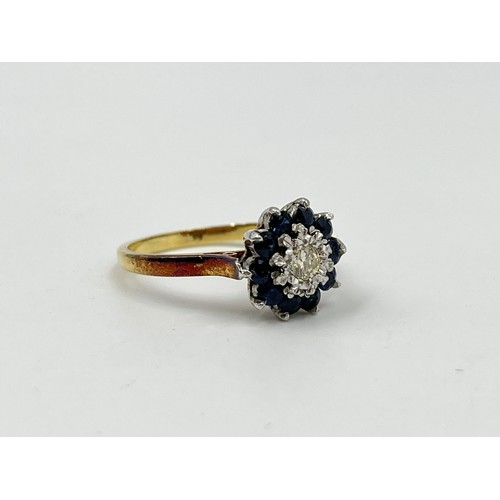 1082 - A hallmarked London 18ct gold sapphire and diamond cluster ring, dated 1967, size P - approx. gross ... 