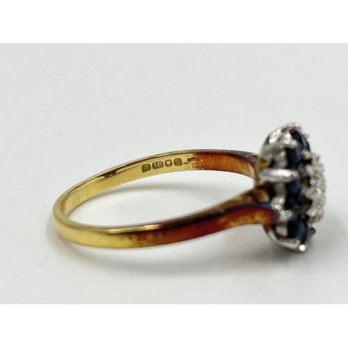 1082 - A hallmarked London 18ct gold sapphire and diamond cluster ring, dated 1967, size P - approx. gross ... 