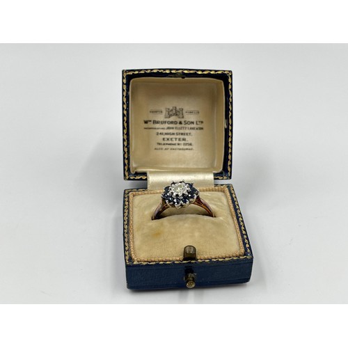 1082 - A hallmarked London 18ct gold sapphire and diamond cluster ring, dated 1967, size P - approx. gross ... 