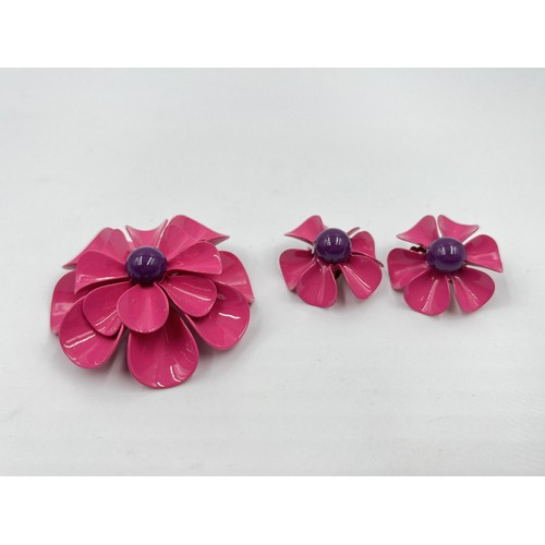 1085 - A mid 20th century pink plastic floral brooch and earrings set