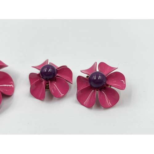 1085 - A mid 20th century pink plastic floral brooch and earrings set