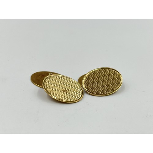 1086 - A pair of hallmarked Birmingham 9ct gold cufflinks, dated 1958 - approx. gross weight 6.34 grams