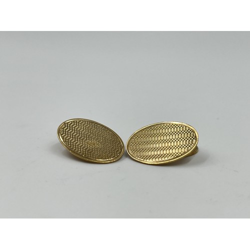 1086 - A pair of hallmarked Birmingham 9ct gold cufflinks, dated 1958 - approx. gross weight 6.34 grams