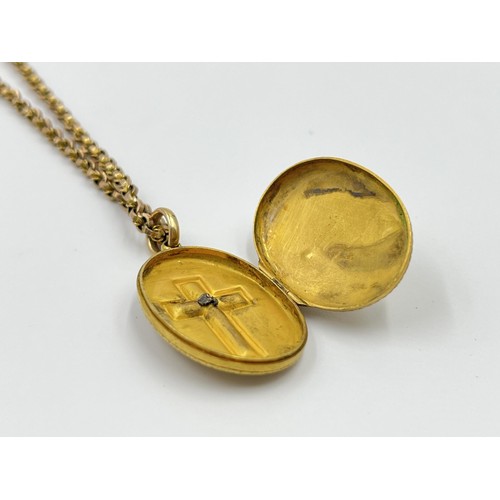 1088 - A stamped 9ct gold belcher chain necklace with yellow metal cross locket pendant - approx. gross wei... 