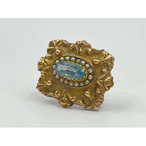 1089 - A late 19th/early 20th century yellow metal seed pearl and aquamarine pin brooch - approx. gross wei... 