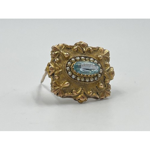 1089 - A late 19th/early 20th century yellow metal seed pearl and aquamarine pin brooch - approx. gross wei... 