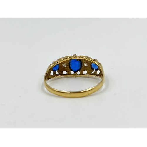 1092 - A hallmarked Birmingham 18ct gold sapphire and diamond ring, dated 1913, size T - approx. gross weig... 