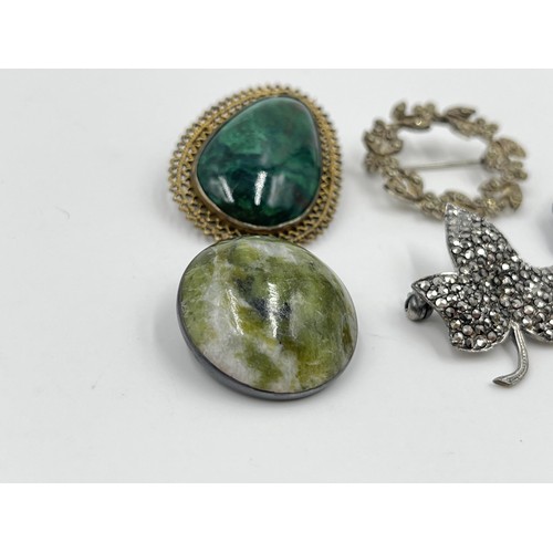 1093 - Five antique and vintage brooches to include CMP hallmarked Dublin silver and Connemara marble dated... 