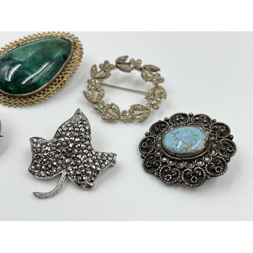 1093 - Five antique and vintage brooches to include CMP hallmarked Dublin silver and Connemara marble dated... 