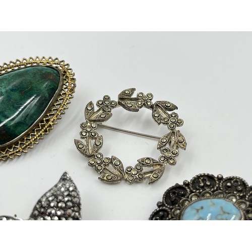 1093 - Five antique and vintage brooches to include CMP hallmarked Dublin silver and Connemara marble dated... 