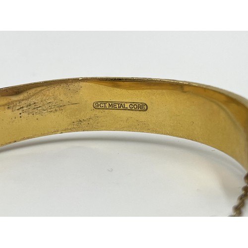 1095 - A 9ct metal core foliate etched bangle - approx. gross weight  24.22 grams