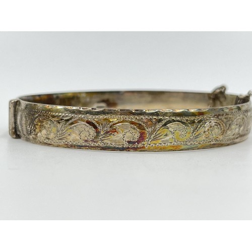 1098 - A W. T. Toghill & Co hallmarked Birmingham silver foliate etched bangle, dated 1963 - approx. gross ... 