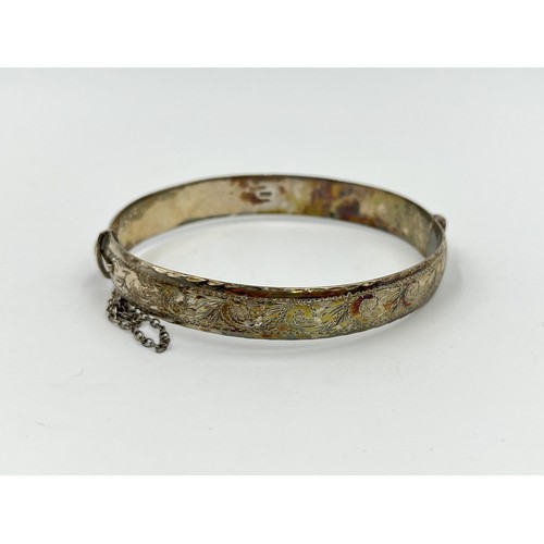 1098 - A W. T. Toghill & Co hallmarked Birmingham silver foliate etched bangle, dated 1963 - approx. gross ... 