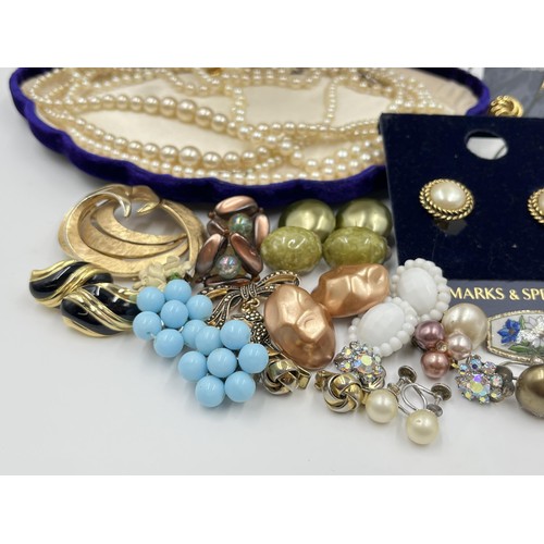 1102 - A collection of costume jewellery to include cultured pearl necklace with stamped 9ct white gold cla... 