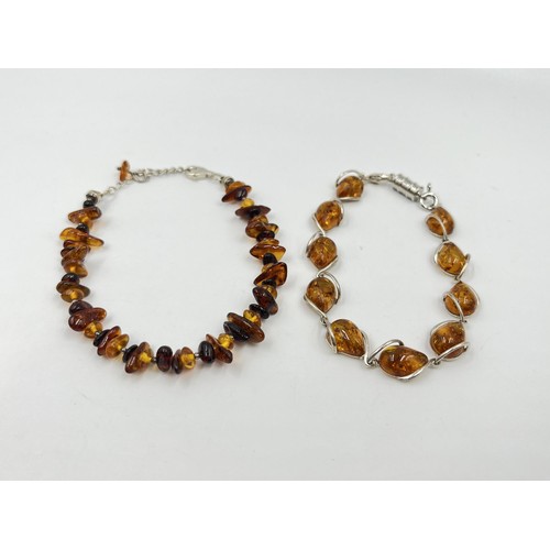 1106 - Two .925 silver and amber bracelets - approx. gross weight 18.47 grams