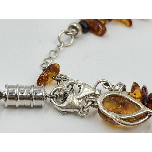 1106 - Two .925 silver and amber bracelets - approx. gross weight 18.47 grams