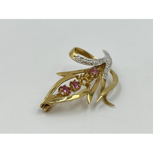 1110 - A hallmarked Birmingham 9ct gold ruby and diamond pin brooch - approx. gross weight 3.91 grams