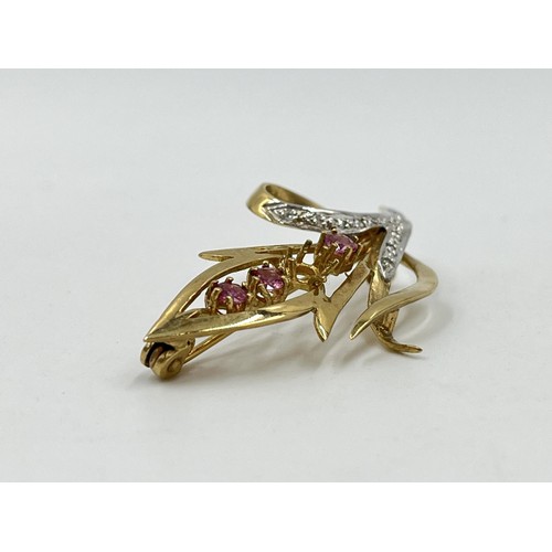 1110 - A hallmarked Birmingham 9ct gold ruby and diamond pin brooch - approx. gross weight 3.91 grams