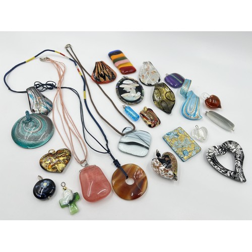 1128 - A collection of art glass pendants