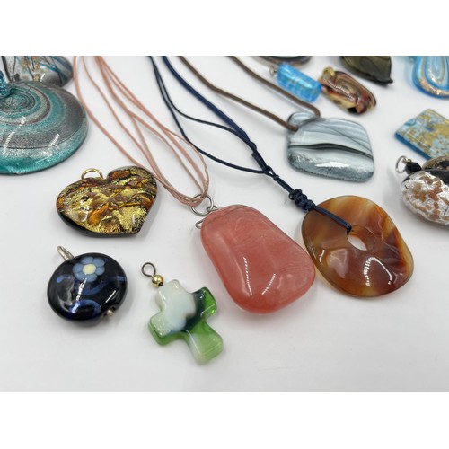 1128 - A collection of art glass pendants