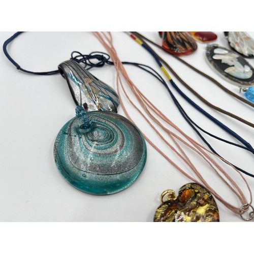 1128 - A collection of art glass pendants