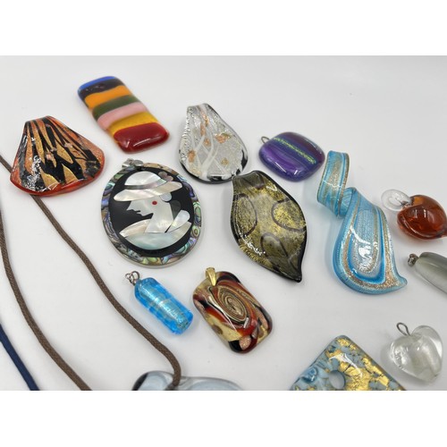 1128 - A collection of art glass pendants