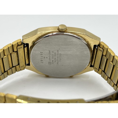 1131 - A 1980s Seiko dual time analogue and digital alarm chronograph wristwatch with Seiko stainless steel... 