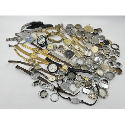 1138 - A large collection of wristwatch parts and lady's wristwatches to include Timex, Seiko etc.