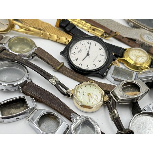 1138 - A large collection of wristwatch parts and lady's wristwatches to include Timex, Seiko etc.