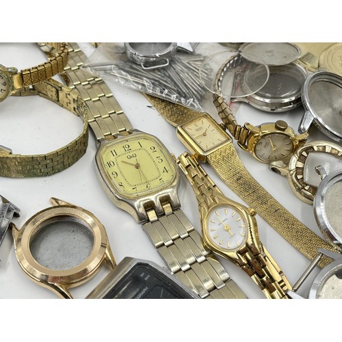 1138 - A large collection of wristwatch parts and lady's wristwatches to include Timex, Seiko etc.