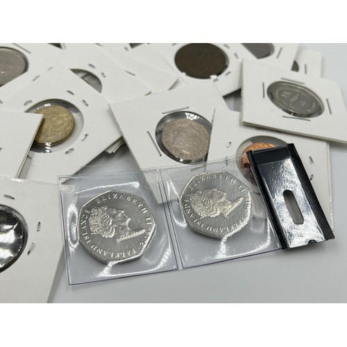 1237 - A collection of British coins to include penguin 50 pence, Falkland Islands etc.