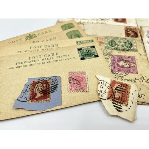 1238 - A collection of antique stamps to include Victorian penny reds etc.