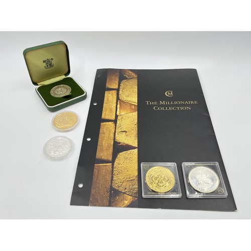 1239 - Five coins to include The Millionaire Collection .925 silver and gold plated Double Leopard, 1972 El... 