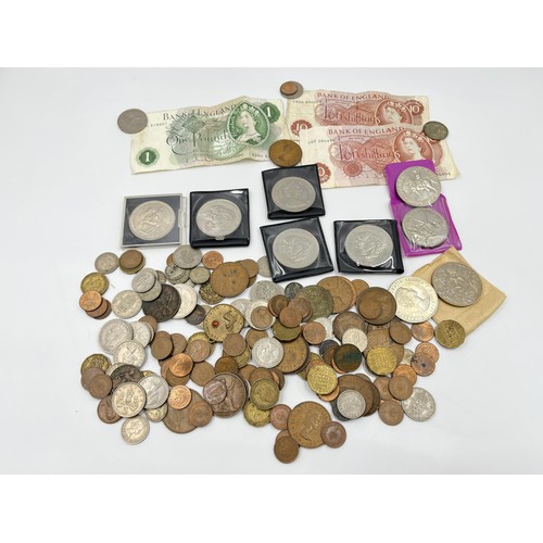 1243 - A collection of British coins and banknotes to include 1922 George V .500 silver one shilling, 1916 ... 