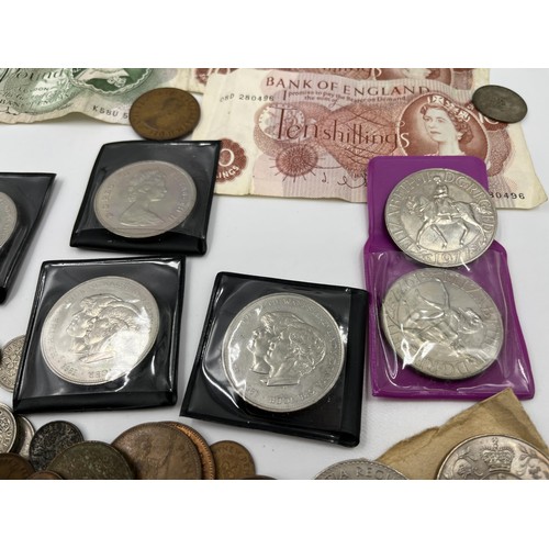 1243 - A collection of British coins and banknotes to include 1922 George V .500 silver one shilling, 1916 ... 