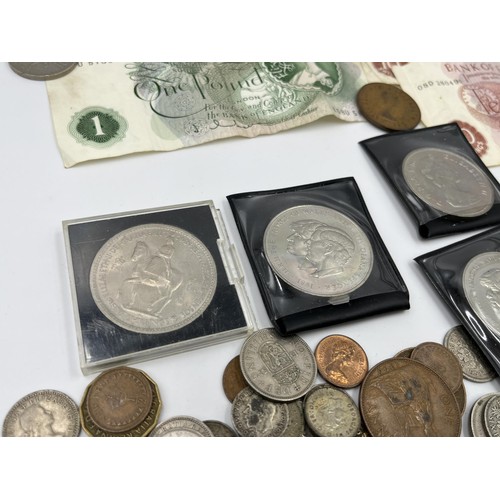 1243 - A collection of British coins and banknotes to include 1922 George V .500 silver one shilling, 1916 ... 