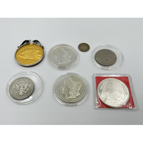 1247 - Seven United States of America coins, one 1943 .900 silver one dime, one Highland Mint .999 silver b... 