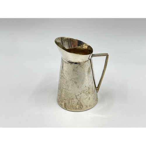 1166 - A Victorian Henry Stratford Ltd hallmarked Sheffield silver milk jug, dated 1890 - approx. gross wei... 