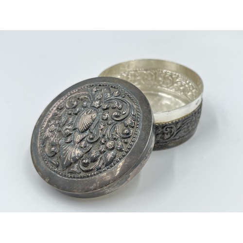 1167 - An .800 silver repousse circular trinket box - approx. gross weight 68.57 grams and 3cm high x 7cm d... 