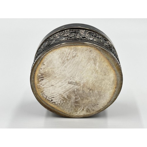 1167 - An .800 silver repousse circular trinket box - approx. gross weight 68.57 grams and 3cm high x 7cm d... 