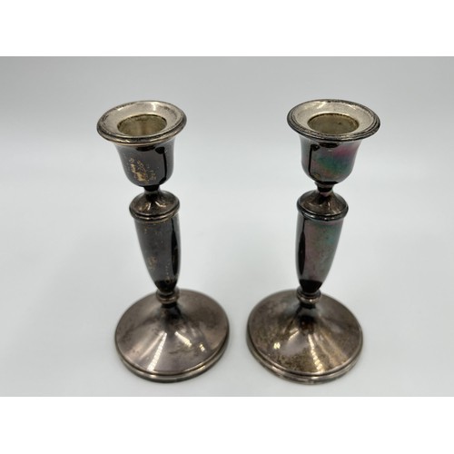 1170 - A pair of Adie Bros Ltd hallmarked Birmingham silver weighted candlesticks, dated 1962 - approx. gro... 