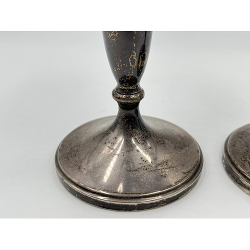 1170 - A pair of Adie Bros Ltd hallmarked Birmingham silver weighted candlesticks, dated 1962 - approx. gro... 