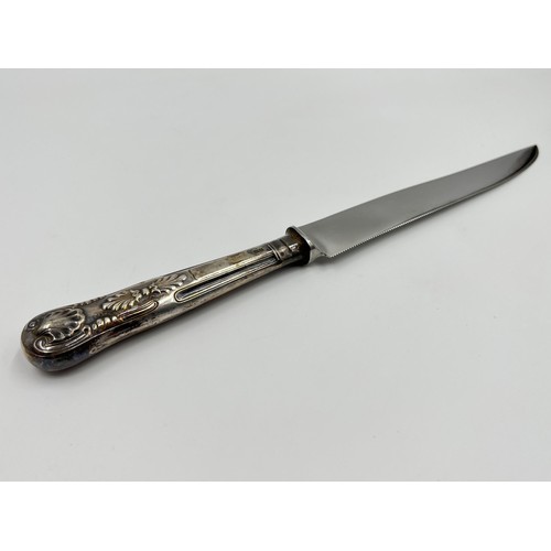 1174 - A Cooper Bros & Sons Ltd hallmarked Sheffield silver handled cake knife, dated 1974 - approx. 26cm l... 